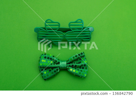 Beautiful table setting for St. Patricks Day celebration on green background 136842790