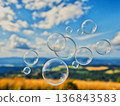 Soap bubbles dancing in the blue sky Soap bubbles dancing in the blue sky 136843583