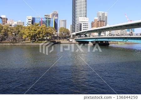 Urban landscape seen from Tenmabashi across the Okawa River in Osaka City Urban landscape seen from Tenmabashi across the Okawa River in Osaka City 136844250