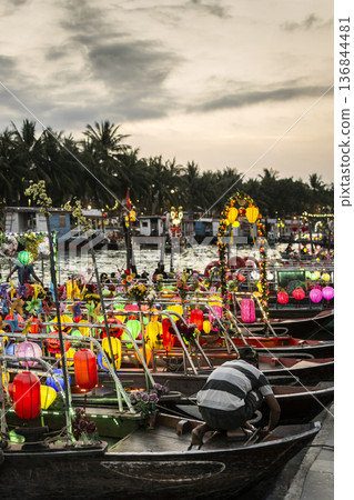 traditional colorful lantern boats at sunset in hoi an old town riverside vietnam traditional colorful lantern boats at sunset in hoi an old town riverside vietnam 136844481