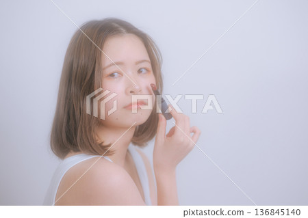 Young woman with natural make-up Young woman with natural make-up 136845140