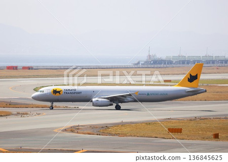 A Yamato Transport cargo plane landing at Kansai International Airport 136845625