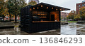 street cafe made from an old shipping container, a concept for an outdoor coffee shop selling favorite coffee drinks and snacks 136846293