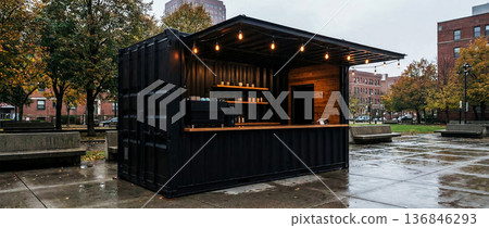 street cafe made from an old shipping container, a concept for an outdoor coffee shop selling favorite coffee drinks and snacks 136846293