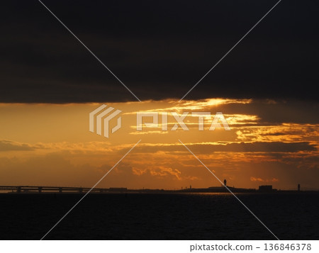 Kansai International Airport, illuminated by the setting sun, creates a fantastic atmosphere Kansai International Airport, illuminated by the setting sun, creates a fantastic atmosphere 136846378