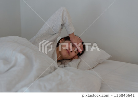 A woman with fever A woman with fever 136846641