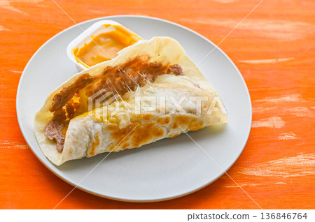 Ground pork and cheese tortilla 136846764