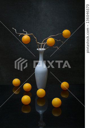 Still life with white and orange balls and white vase Still life with white and orange balls and white vase 136846870