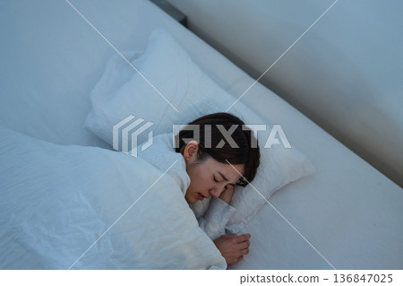 Sleepy woman 136847025