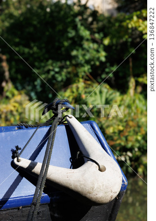 Close-up of plastic front fender on a moored canal narrowboat 136847222