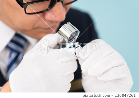 A man giving an appraisal A man giving an appraisal 136847261