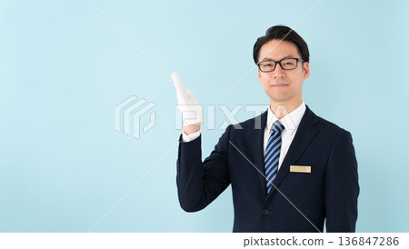Businessman with white gloves holding hands Businessman with white gloves holding hands 136847286