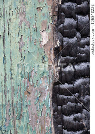 Peeling green paint and burnt black wooden post Peeling green paint and burnt black wooden post 136848228
