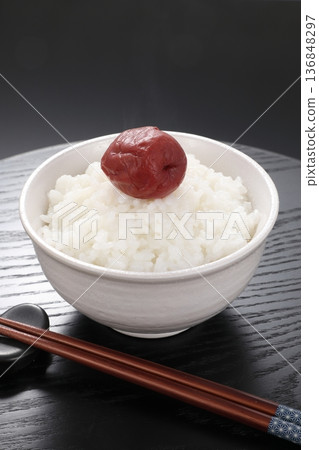 Pickled plums on rice 136848297