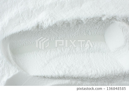Soda powder sodium bicarbonate surface. Abstract white background with space for text 136848585