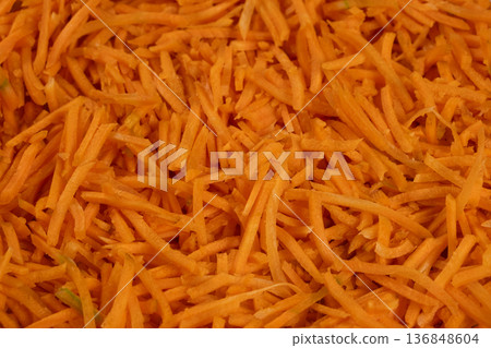 Close up of bright orange carrot julienne top view Close up of bright orange carrot julienne top view 136848604