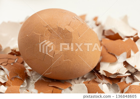 Broken shell texture, macro shot of a hard boiled egg. Broken shell texture, macro shot of a hard boiled egg. 136848605