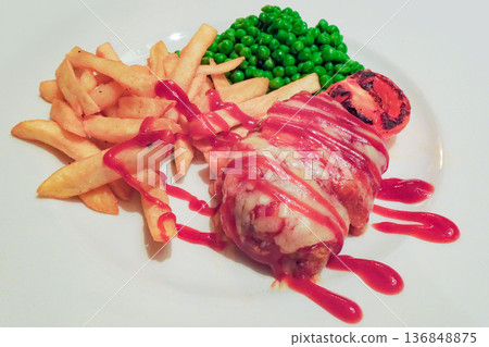 British-style chicken dish and fries British-style chicken dish and fries 136848875