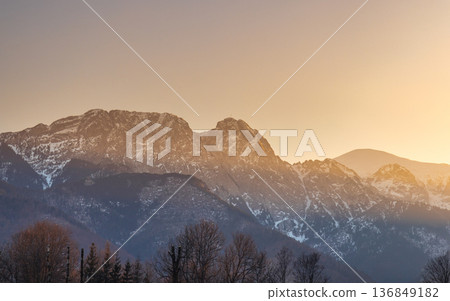 Giewont peak in Tatra Mountains above Zakopane town in Poland, Europe. An abstract landscape is created through a grid of colorful blocks that obscure and reveal natural imagery fragments. 136849182