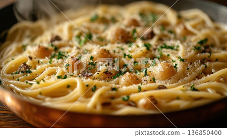 Spaghetti with garlic, parmesan, black pepper, and fresh herbs 136850400