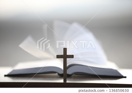 Background of the Bible with the cross symbolizing the death and resurrection of Jesus Christ and the Word of Life Background of the Bible with the cross symbolizing the death and resurrection of Jesus Christ and the Word of Life 136850630