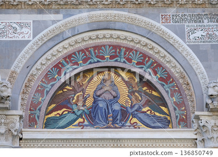 Virgin Mary, colourful mosaic by Giuseppe Modena da Lucca, above the middle door of Cathedral in Pisa, Italy. Unesco World Heritage Site. Virgin Mary, colourful mosaic by Giuseppe Modena da Lucca, above the middle door of Cathedral in Pisa, Italy. Unesco World Heritage Site. 136850749