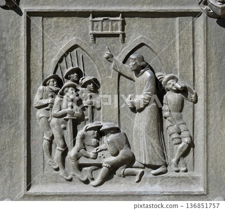 Zwingli preaches for the Swiss mercenaries at Monza before the battle of Maringnano, 1515., relief on the door of the Grossmunster ("great minster") church in Zurich, Switzerland Zwingli preaches for the Swiss mercenaries at Monza before the battle of Maringnano, 1515., relief on the door of the Grossmunster ("great minster") church in Zurich, Switzerland 136851757