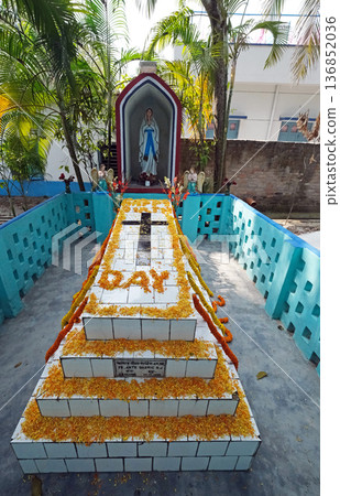 The tomb of a Croatian missionary, Jesuit father Ante Gabric, decorated on the occasion of his 105th birthday in Kumrokhali, West Bengal, India The tomb of a Croatian missionary, Jesuit father Ante Gabric, decorated on the occasion of his 105th birthday in Kumrokhali, West Bengal, India 136852036