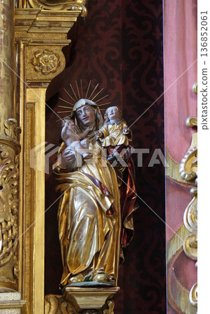 Saint Anne holds, Jesu and Virgin Mary, statue on the altar of Assumption in the church of St. Leodegar in Lucerne, Switzerland Saint Anne holds, Jesu and Virgin Mary, statue on the altar of Assumption in the church of St. Leodegar in Lucerne, Switzerland 136852061