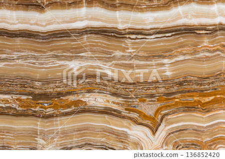Beige travertine background. Wavy stripes texture. 136852420