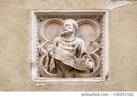 Biblical story, tile relief, external wall of Orsanmichele Church in Florence, Tuscany, Italy Biblical story, tile relief, external wall of Orsanmichele Church in Florence, Tuscany, Italy 136852582