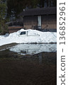 Light trucks and warehouses buried in snow: everyday life in the countryside in winter 136852961