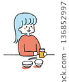 A woman having a drink alone 136852997