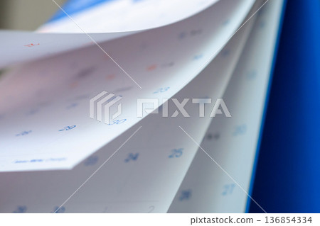 Abstract blur calendar page flipping sheet close up background business schedule planning appointment meeting concept Abstract blur calendar page flipping sheet close up background business schedule planning appointment meeting concept 136854334
