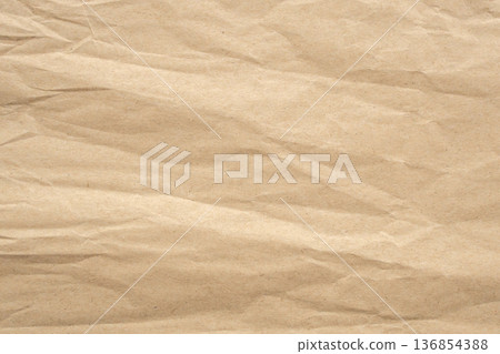 Abstract crumpled and creased recycle brown paper texture background Abstract crumpled and creased recycle brown paper texture background 136854388