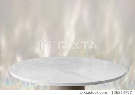 Round marble table top with abstract shadow drop on white wall background for mockup product display Round marble table top with abstract shadow drop on white wall background for mockup product display 136854797