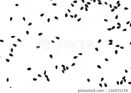 Black sesame seeds isolated on white background 136855256