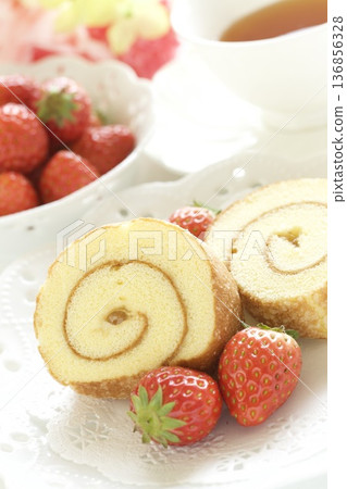 Strawberries and roll cake Strawberries and roll cake 136856328
