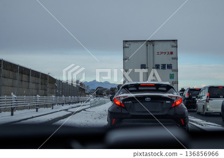 Heavy traffic on the highway due to winter tire checks 136856966