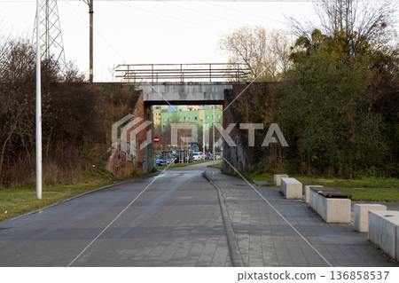 Bridge crossing with graffiti in urban area during early morning light Bridge crossing with graffiti in urban area during early morning light 136858537