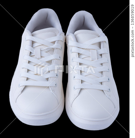Pair of White Sneakers isolated on black background top view 136859019