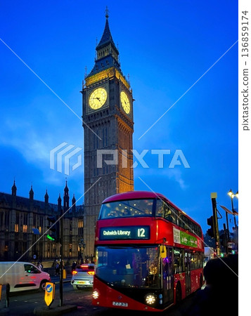 London Big Ben and a red double-decker bus at dusk 136859174