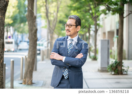 Middle-aged businessman Middle-aged businessman 136859218