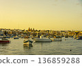 Panoramic view of the sunset in the port of Marsaxlokk with its boats. Malta. 136859288