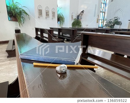 new testament on the bench in the Catholic chirch 136859322