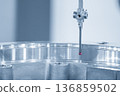 Quality inspection of a precision aluminum component using a Coordinate Measuring Machine (CMM) with a modular tactile probe. 136859502