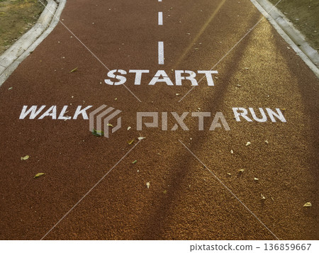 Athlete running track forward as motivation and inspiration Athlete running track forward as motivation and inspiration 136859667