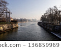 View of a river and buildings under a clear sky in a city during the morning 136859969