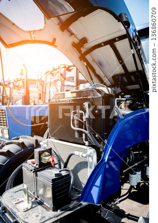 Modern new agricultural tractor engine. Machinery and equipment 136860709