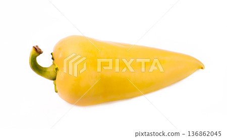 One whole yellow peppers on a white background 136862045